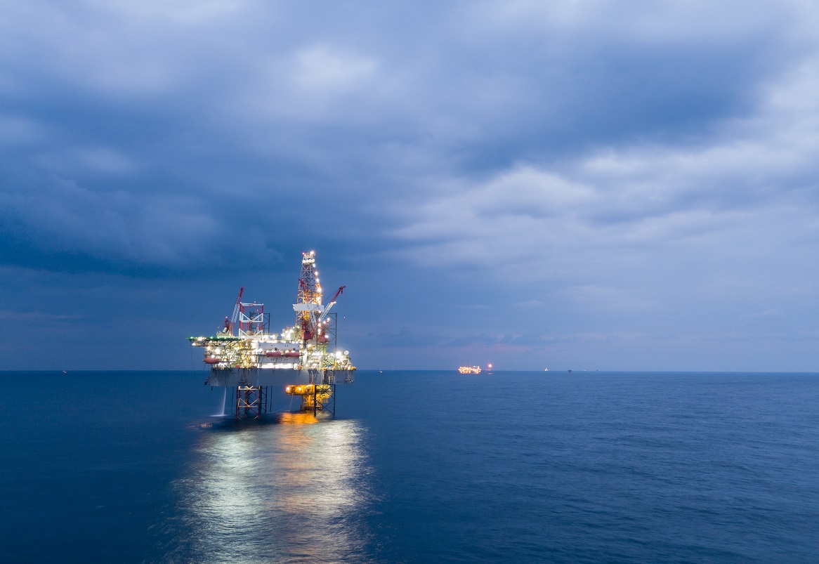 Oil platform in stormy sea